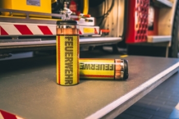 Preview: Thermobecher "Feuerwehrschlauch-gelb"